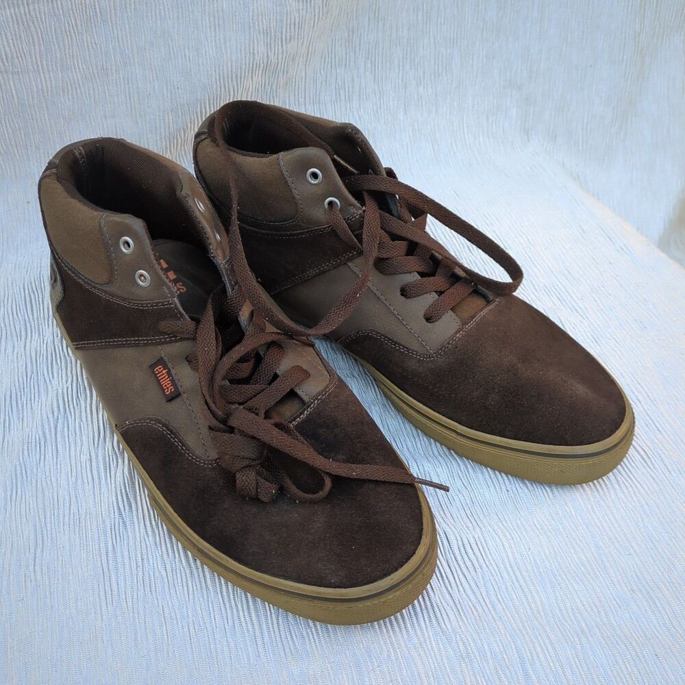 Etnies high-top skate shoes featuring a brown suede and dark brown canvas upper